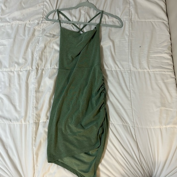 Backless mini dress with a hint of sparkle like features size 2 (small) - Picture 1 of 2